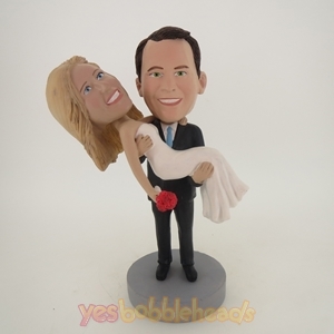 Picture of Custom Bobblehead Doll: Groom Happily Holding Up Bride